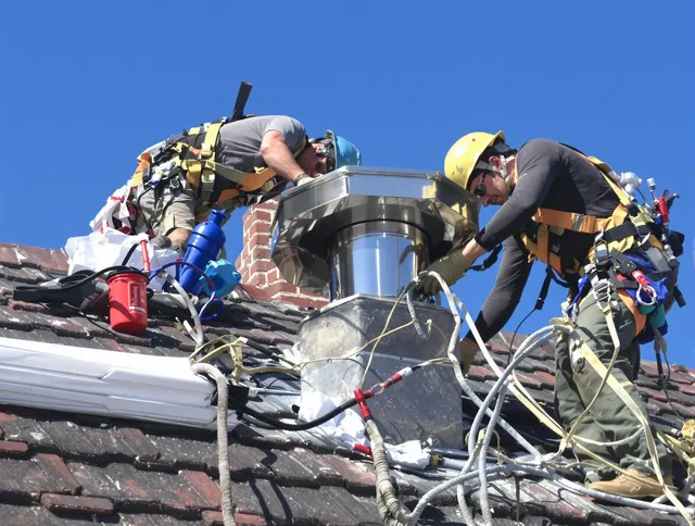 Protective chimney cap installed by Kannapolis Chimney Sweep in Kannapolis, NC