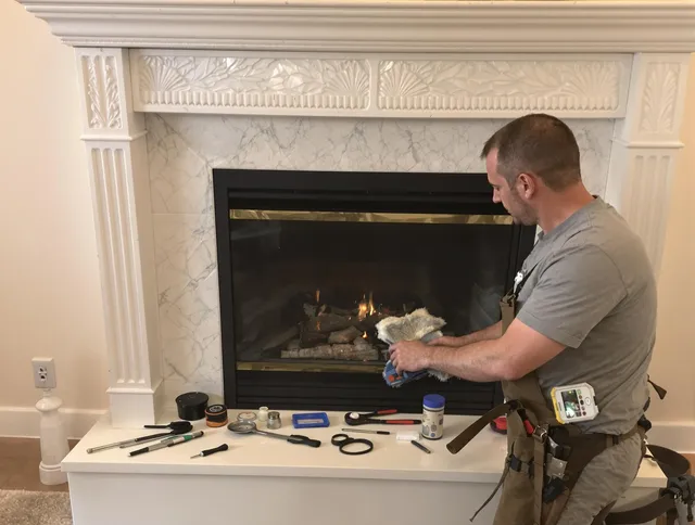 Kannapolis Chimney Sweep performing fireplace maintenance in Kannapolis, NC